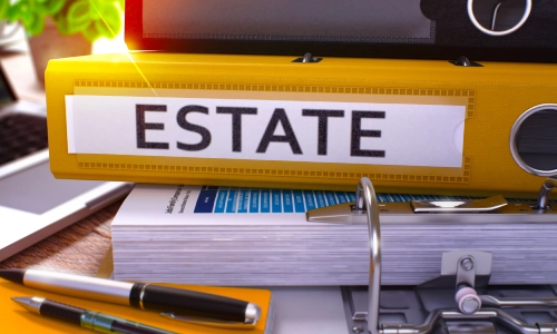 Ring binder labeled “Estate” on a desk, illustrating New York estate planning lawyer services.