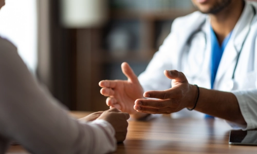 An Albany personal injury attorney consulting with a medical professional about pain and suffering evidence related to a client’s injury claim.